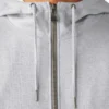 Sudadera con capucha y cremallera de un cuarto